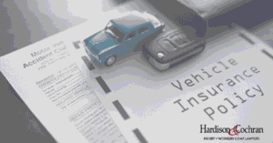 North Carolina driver reviewing car insurance policy limits after a crash
