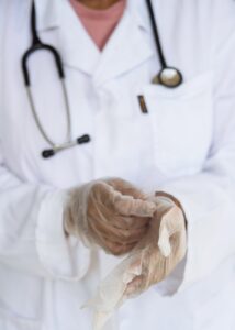 doctor wearing gloves medical negligence
