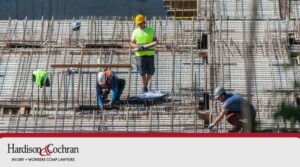 construction workers working on the roof