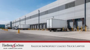 Trucks at a warehouse loading dock in Raleigh.