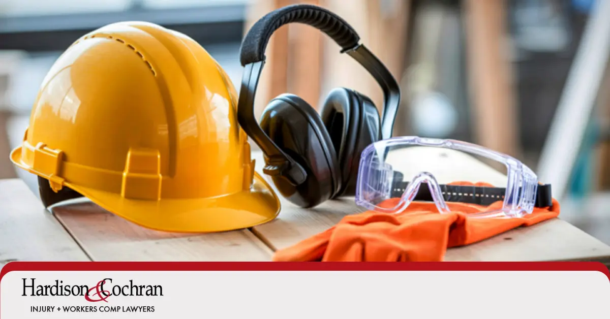 Injured worker reviewing paperwork for a Greensboro workers' compensation claim